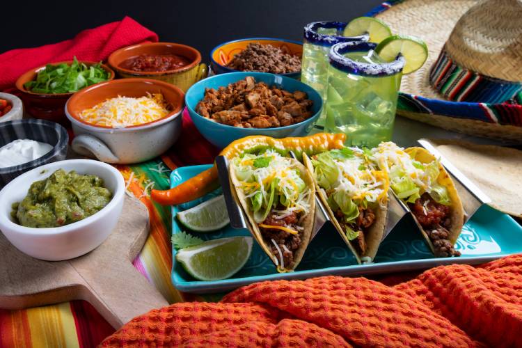 Tacos and mexican food on a table