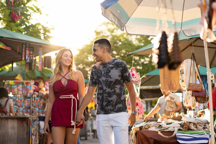 Couple shopping at outdoor market